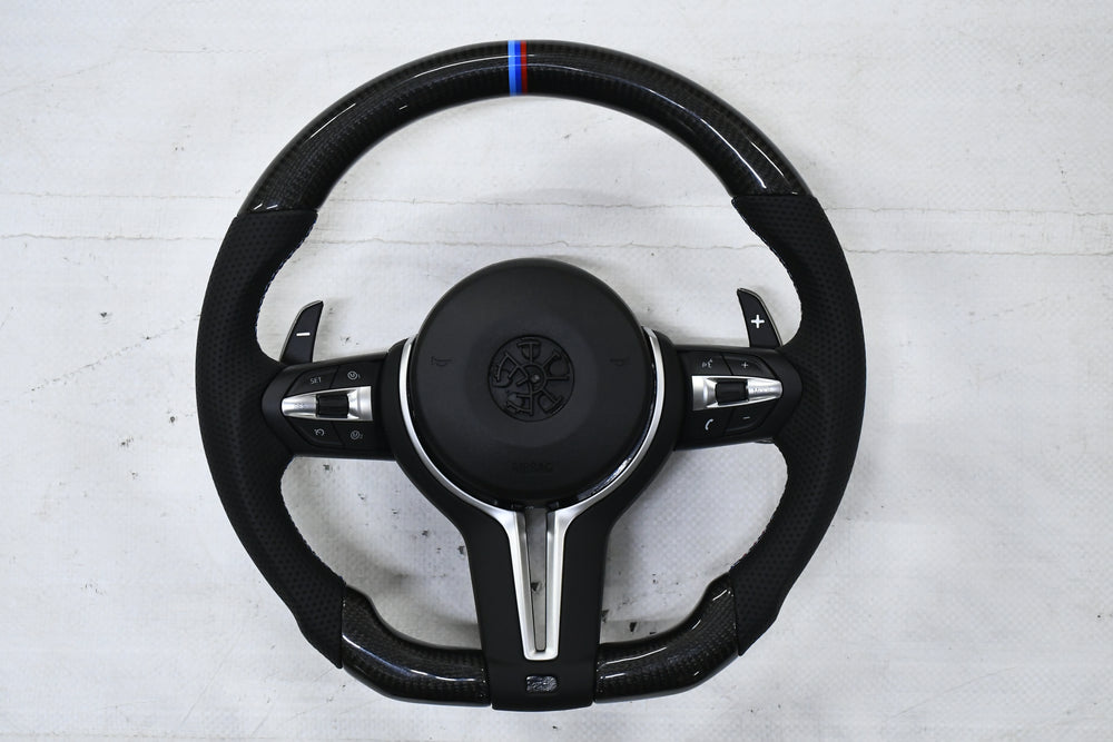 
                  
                    BMW M3 F30 Steering Wheel real carbon, 3 Series F30 2013-19 , 1 Series F20 2013-18 , X1 F48 2016-22 , X3 F25 2010-16, X5 F15 2014-17 , 3 GT F34 , X6 2014-17
                  
                
