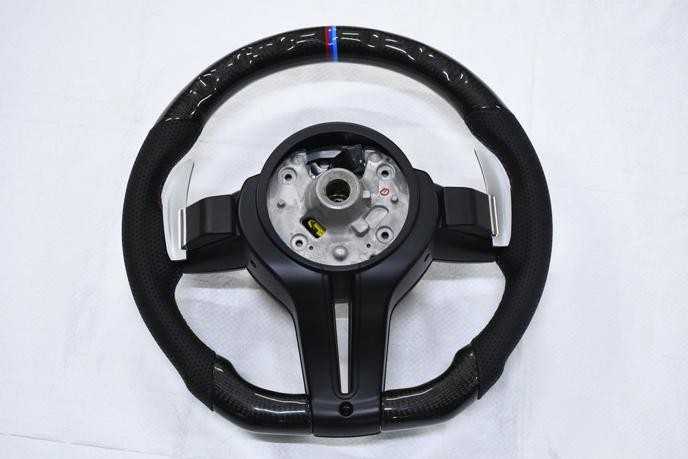 
                  
                    BMW M3 F30 Steering Wheel real carbon, 3 Series F30 2013-19 , 1 Series F20 2013-18 , X1 F48 2016-22 , X3 F25 2010-16, X5 F15 2014-17 , 3 GT F34 , X6 2014-17
                  
                