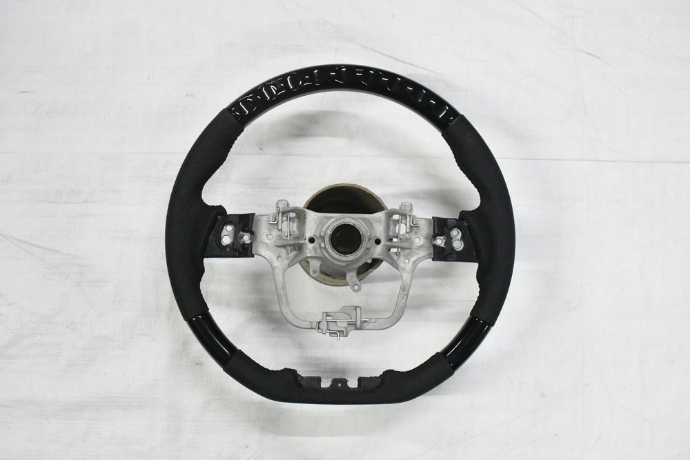 
                  
                    G SERIES LEATHER STEERING WHEEL- For All G Series
                  
                