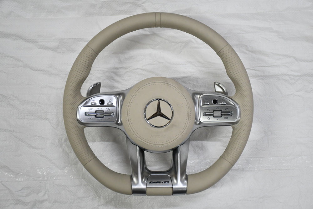 
                  
                    AMG Steering Wheel for Mercedes Beige, E class W212 2009-2015 , E Class W213 2017 , C Class W204 2009-14 , GLA 2014/19 , Cla 2014-19 , A Class 176 2014-19 , GLE W166 2015-18  W166 2015-18 , ML 2013-15 , GL 2013-15 , SLK ,W205 2015-18 , W222 2014-16
                  
                