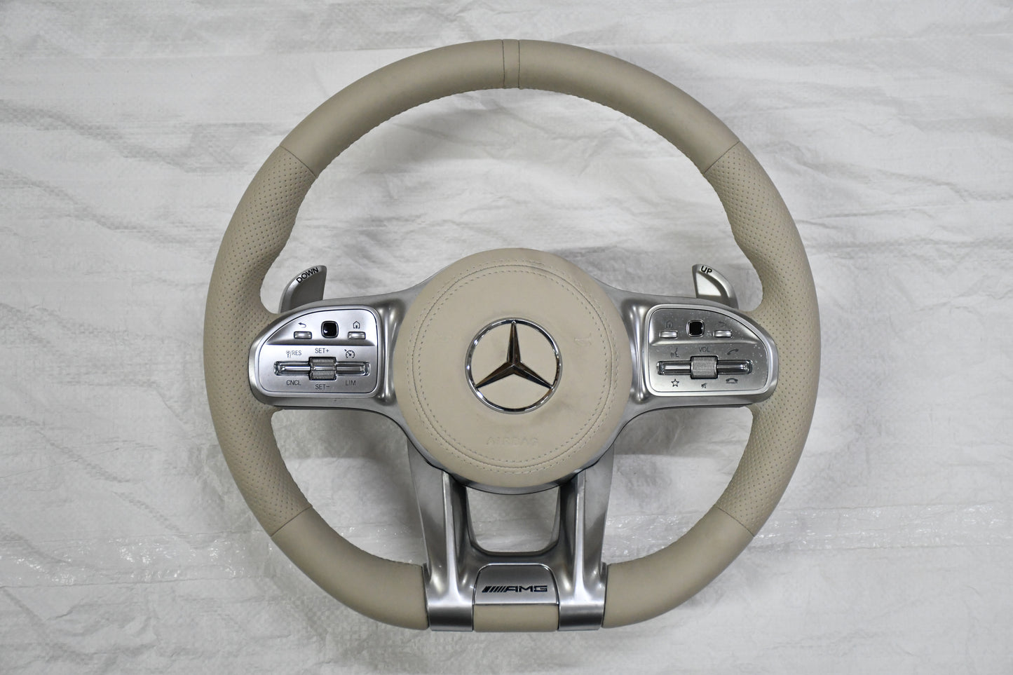 
                  
                    AMG Steering Wheel for Mercedes Beige, E class W212 2009-2015 , E Class W213 2017 , C Class W204 2009-14 , GLA 2014/19 , Cla 2014-19 , A Class 176 2014-19 , GLE W166 2015-18  W166 2015-18 , ML 2013-15 , GL 2013-15 , SLK ,W205 2015-18 , W222 2014-16
                  
                