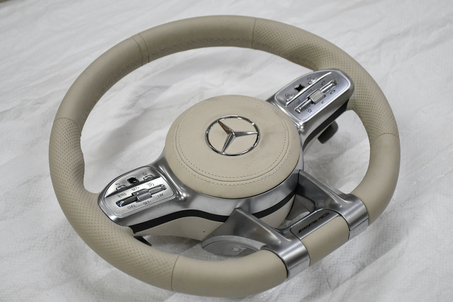 
                  
                    AMG Steering Wheel for Mercedes Beige, E class W212 2009-2015 , E Class W213 2017 , C Class W204 2009-14 , GLA 2014/19 , Cla 2014-19 , A Class 176 2014-19 , GLE W166 2015-18  W166 2015-18 , ML 2013-15 , GL 2013-15 , SLK ,W205 2015-18 , W222 2014-16
                  
                