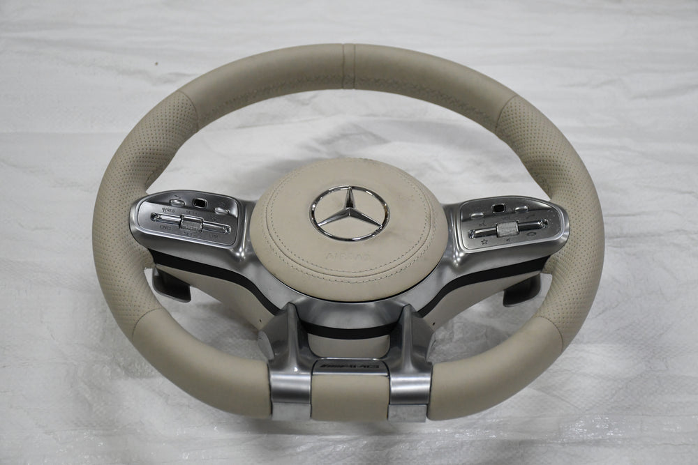 
                  
                    AMG Steering Wheel for Mercedes Beige, E class W212 2009-2015 , E Class W213 2017 , C Class W204 2009-14 , GLA 2014/19 , Cla 2014-19 , A Class 176 2014-19 , GLE W166 2015-18  W166 2015-18 , ML 2013-15 , GL 2013-15 , SLK ,W205 2015-18 , W222 2014-16
                  
                