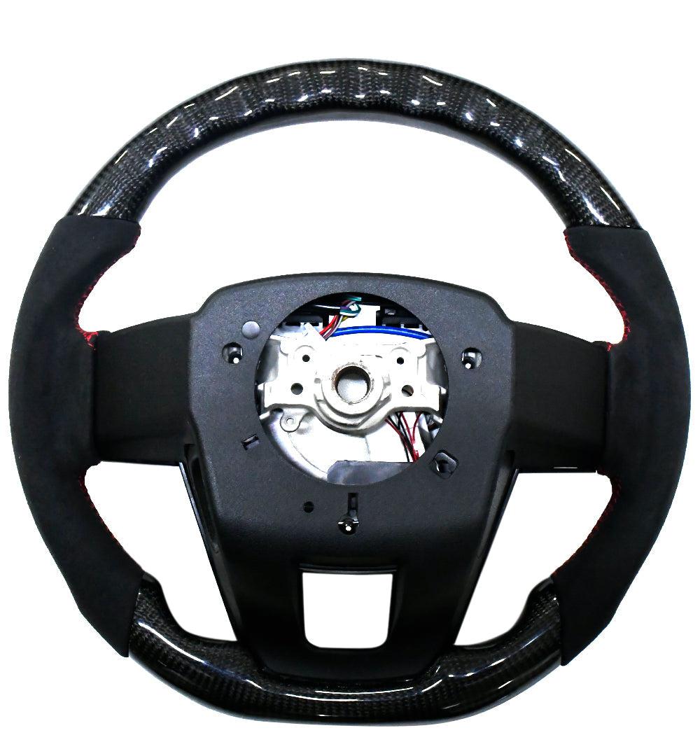 
                  
                    Fortuner Real Carbon With Led Steering wheel-STEERING WHEEL-RETRO SOLUTIONS-CARPLUS
                  
                