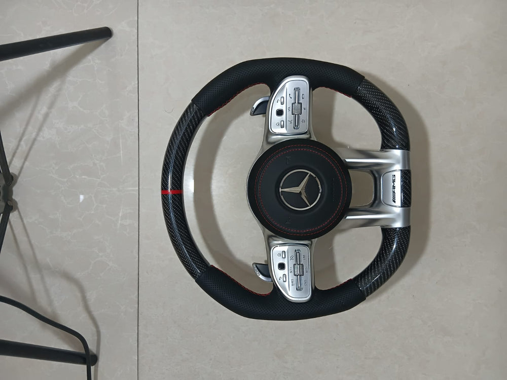 
                  
                    AMG Carbon Steering Wheel for Mercedes Black, E class W212 2009-2015 , E Class W213 2017 , C Class W204 2009-14 , GLA 2014/19 , Cla 2014-19 , A Class 176 2014-19 ,W166 2015-18 , W166 2015-18 , ML 2013-15 , GL 2013-15 , SLK , W205 2015-18 , W222 2014-16
                  
                