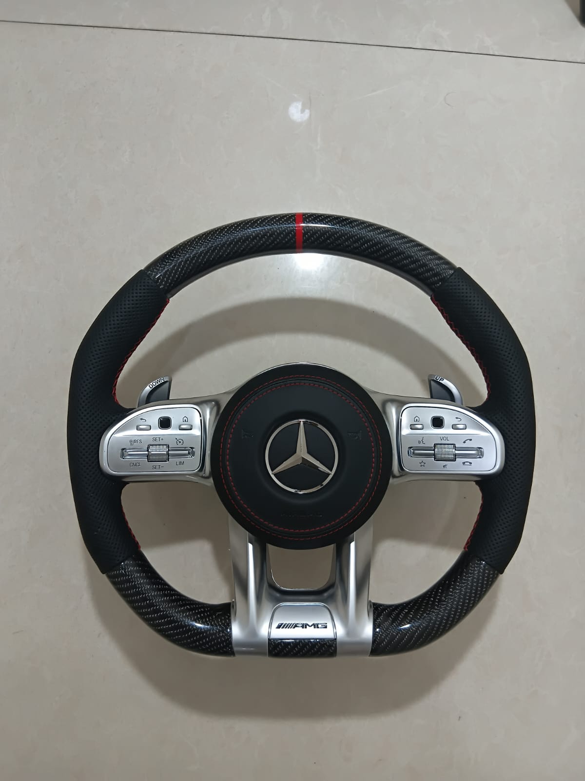 
                  
                    AMG Carbon Steering Wheel for Mercedes Black, E class W212 2009-2015 , E Class W213 2017 , C Class W204 2009-14 , GLA 2014/19 , Cla 2014-19 , A Class 176 2014-19 ,W166 2015-18 , W166 2015-18 , ML 2013-15 , GL 2013-15 , SLK , W205 2015-18 , W222 2014-16
                  
                