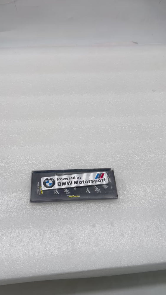 
                  
                    Load and play video in Gallery viewer, KMH Powered by BMW Motorsport Rectangular Badge with Chrome Effect
                  
                